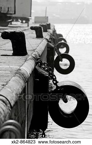 Stock Image - moorings and ship protections, Port Barcelona, Catalunya, Spain. Fotosearch