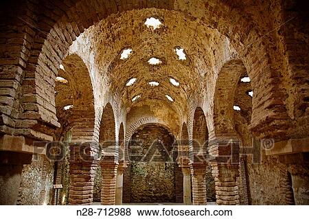 Stock Photo - Moorish baths of Ronda (c. 13th century). MBlaga province, Andalusia, Spain. Fotosearch