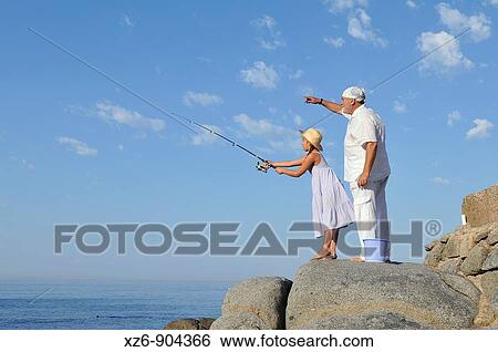 morning fishing with grandpa View Large Photo Image Stock Photograph - morning fishing with grandpa. Fotosearch