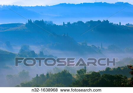 Morning fog, San Gimignano, Siena Province, UNESCO World Heritage Site, Tuscany landscape, Italy, Europe View Large Photo Image Stock Photo - Morning fog, San Gimignano, Siena Province, UNESCO World Heritage Site, Tuscany landscape, Italy, Europe. Fotosearch