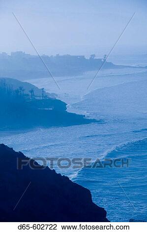 Morocco. Atlantic Coast. Taghazout: Atlantic Coast in morning mist View Large Photo Image Stock Image - Morocco. Atlantic Coast. Taghazout: Atlantic Coast in morning mist. Fotosearch