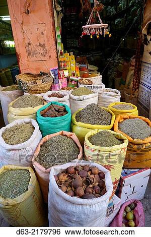 Stock Photograph - Morocco - Marrakesh. Beans and herbs on sale in market. Fotosearch