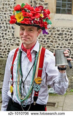 Morris dancer with floral hat and tankard of beer taking part in the Winchester Spring Festival in England View Large Photo Image Stock Photograph - Morris dancer with floral hat and tankard of beer taking part in the Winchester Spring Festival in England. Fotosearch