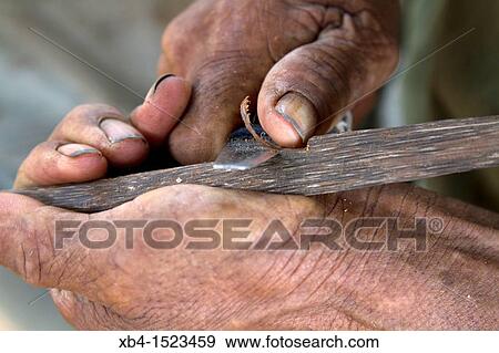 Moseten tribe, preparing an arrow, Asuncion del Quiquibey, Rurrenabaque, Bolivia View Large Photo Image Stock Photo - Moseten tribe, preparing an arrow, Asuncion del Quiquibey, Rurrenabaque, Bolivia. Fotosearch