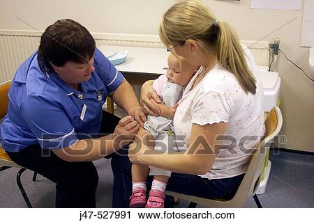 Mother and 1 year old girl, at the doctors office, having her injections View Large Photo Image Stock Image - Mother and 1 year old girl, at the doctors office, having her injections. Fotosearch