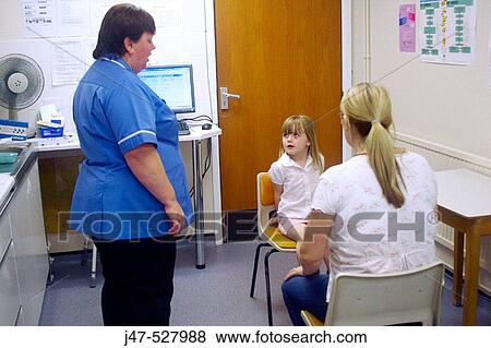 Mother and 4 year old daughter, at the doctors office, having her injections View Large Photo Image Stock Photo - Mother and 4 year old daughter, at the doctors office, having her injections. Fotosearch