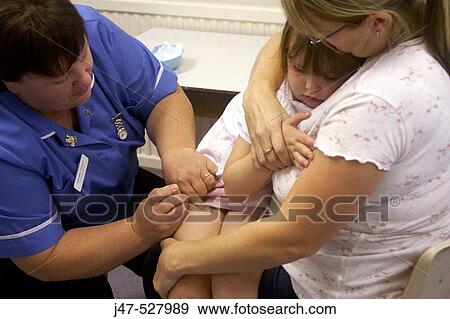 Mother and 4 year old daughter, at the doctors office, having her injections View Large Photo Image Stock Photo - Mother and 4 year old daughter, at the doctors office, having her injections. Fotosearch