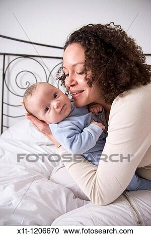 Mother and baby. View Large Photo Image Stock Image - Mother and baby.. Fotosearch
