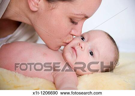 Stock Image - Mother and baby.. Fotosearch