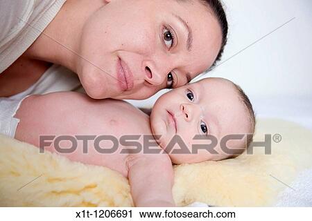 Stock Image - Mother and baby.. Fotosearch
