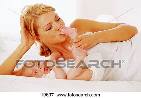 Stock Photo - Mother and baby. Fotosearch