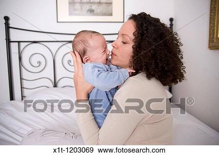 Mother and baby. View Large Photo Image Stock Photo - Mother and baby.. Fotosearch