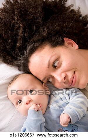 Mother and baby. View Large Photo Image Stock Photo - Mother and baby.. Fotosearch