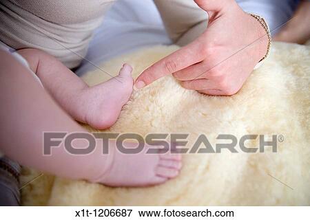 Mother and baby. View Large Photo Image Stock Photo - Mother and baby.. Fotosearch