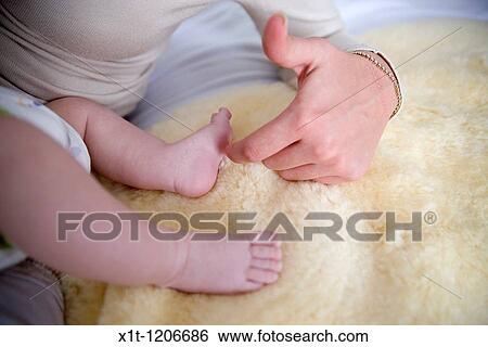 Mother and baby. View Large Photo Image Stock Photograph - Mother and baby.. Fotosearch