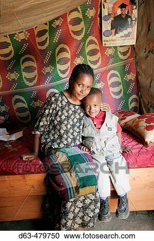 Mother and child, both HIV positive, at home in Addis Ababa, Ethiopia View Large Photo Image Stock Image - Mother and child, both HIV positive, at home in Addis Ababa, Ethiopia. Fotosearch