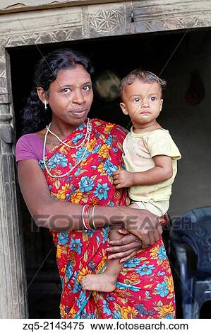 Mother and child. Santhal tribe, Jarweadhi village, Bishangarh block, District Hazaribaug, Jharkhand. View Large Photo Image Stock Photography - Mother and child. Santhal tribe, Jarweadhi village, Bishangarh block, District Hazaribaug, Jharkhand.. Fotosearch