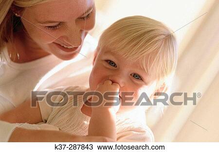 Stock Image - Mother and child. Fotosearch