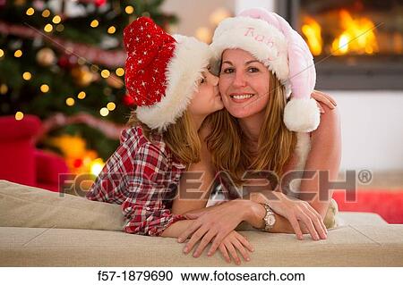 Mother and daughter at Christmas time View Large Photo Image Stock Image - Mother and daughter at Christmas time. Fotosearch