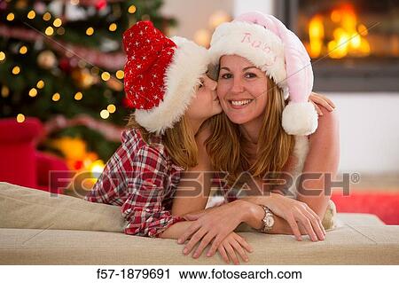 Mother and daughter at Christmas time View Large Photo Image Stock Image - Mother and daughter at Christmas time. Fotosearch