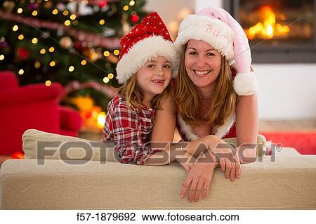 Mother and daughter at Christmas time View Large Photo Image Stock Image - Mother and daughter at Christmas time. Fotosearch