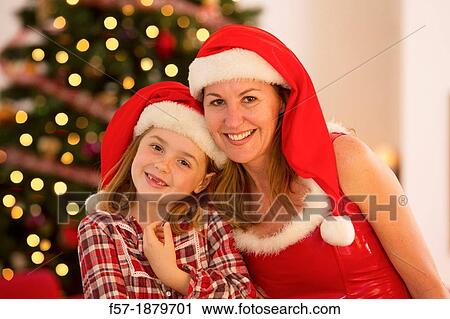 Mother and daughter at Christmas time View Large Photo Image Stock Image - Mother and daughter at Christmas time. Fotosearch