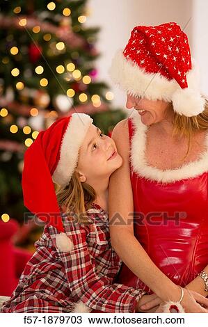 Mother and daughter at Christmas time View Large Photo Image Stock Image - Mother and daughter at Christmas time. Fotosearch