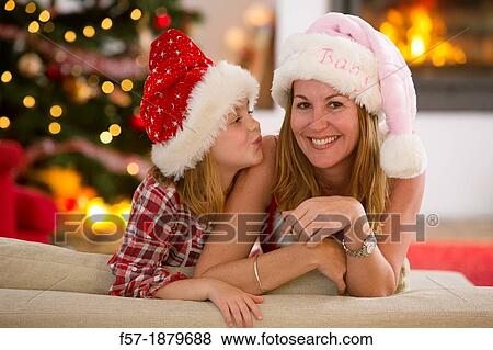 Mother and daughter at Christmas time View Large Photo Image Stock Photo - Mother and daughter at Christmas time. Fotosearch