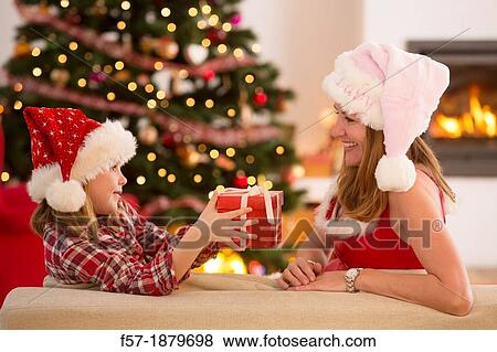 Mother and daughter at Christmas time View Large Photo Image Stock Photo - Mother and daughter at Christmas time. Fotosearch