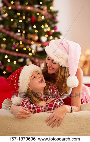 Mother and daughter at Christmas time View Large Photo Image Stock Photograph - Mother and daughter at Christmas time. Fotosearch
