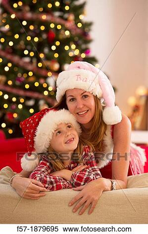 Mother and daughter at Christmas time View Large Photo Image Stock Photography - Mother and daughter at Christmas time. Fotosearch