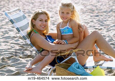 mother and daughter at the beach View Large Photo Image Picture - mother and daughter at the beach. Fotosearch