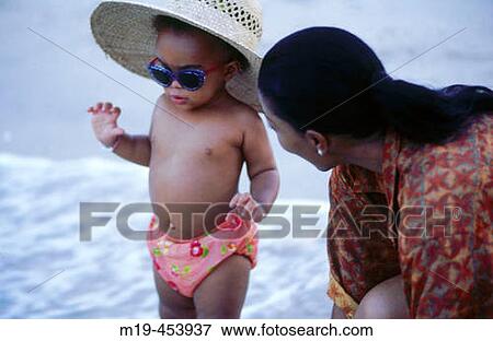 mother and daughter at the beach View Large Photo Image Stock Photo - mother and daughter at the beach. Fotosearch