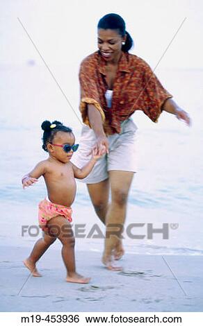 mother and daughter at the beach View Large Photo Image Stock Photograph - mother and daughter at the beach. Fotosearch