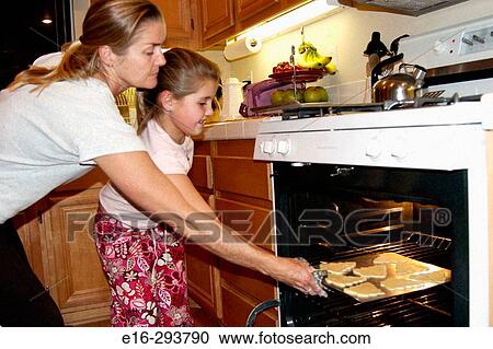 mother and daughter baking cookies View Large Photo Image Stock Image - mother and daughter baking cookies. Fotosearch