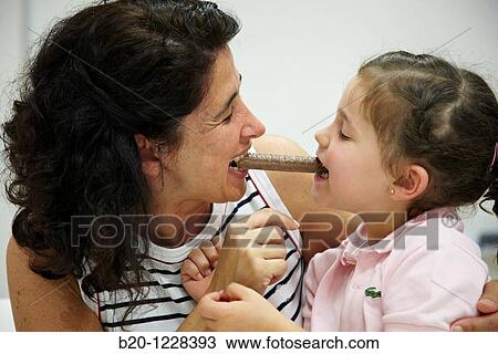 Mother and daughter eating a chocolate bar, tasting session in sensory analysis lab, AZTI-Tecnalia Marine and Food Research Center, Derio, Bizkaia, Euskadi, Spain View Large Photo Image Stock Image - Mother and daughter eating a chocolate bar, tasting session in sensory analysis lab, AZTI-Tecnalia Marine and Food Research Center, Derio, Bizkaia, Euskadi, Spain. Fotosearch