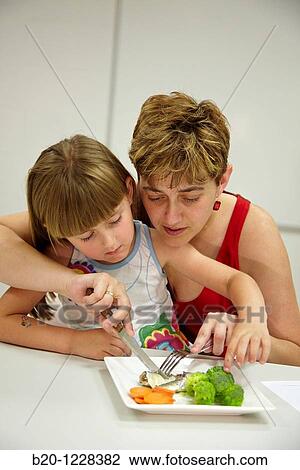 Mother and daughter eating vegetables, tasting session in sensory analysis lab, AZTI-Tecnalia Marine and Food Research Center, Derio, Bizkaia, Euskadi, Spain View Large Photo Image Stock Image - Mother and daughter eating vegetables, tasting session in sensory analysis lab, AZTI-Tecnalia Marine and Food Research Center, Derio, Bizkaia, Euskadi, Spain. Fotosearch