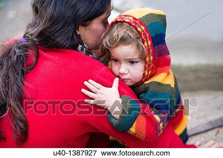 Mother and daughter embracing View Large Photo Image Stock Photo - Mother and daughter embracing. Fotosearch