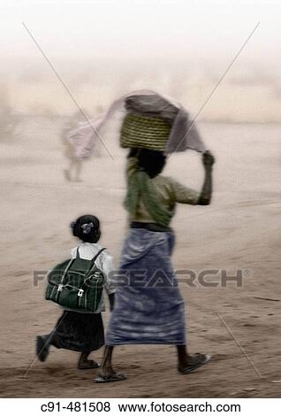 Mother and daughter going to school. India View Large Photo Image Stock Photo - Mother and daughter going to school. India. Fotosearch