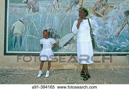 Mother and daughter going to the Sunday mass and baptism in the Pentecotist New Testament church. City of Kingston. Jamaica. West Indies. View Large Photo Image Stock Photography - Mother and daughter going to the Sunday mass and baptism in the Pentecotist New Testament church. City of Kingston. Jamaica. West Indies.. Fotosearch