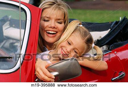 mother and daughter in a car View Large Photo Image Stock Photo - mother and daughter in a car. Fotosearch