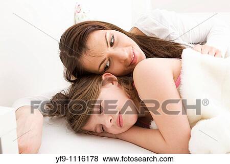 Mother and daughter in bed. View Large Photo Image Stock Photo - Mother and daughter in bed.. Fotosearch