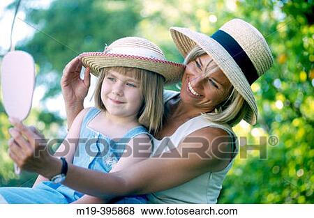 mother and daughter in hats View Large Photo Image Stock Photo - mother and daughter in hats. Fotosearch