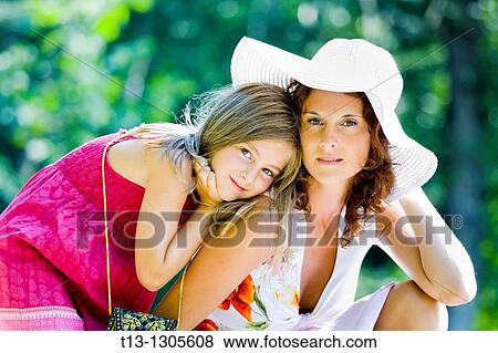 Stock Photo - Mother and daughter in the park. Fotosearch