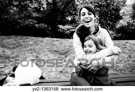 Mother and daughter laughing View Large Photo Image Stock Photo - Mother and daughter laughing. Fotosearch
