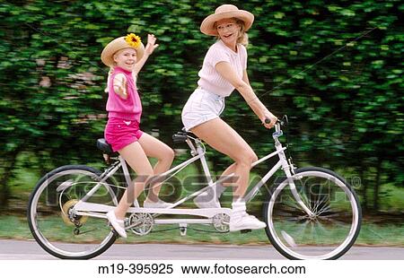 mother and daughter on a? bicycle built for two? View Large Photo Image Stock Photography - mother and daughter on a? bicycle built for two?. Fotosearch