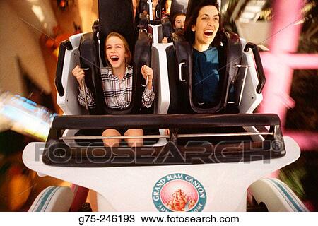 Mother and daughter on roller coaster View Large Photo Image Stock Image - Mother and daughter on roller coaster. Fotosearch