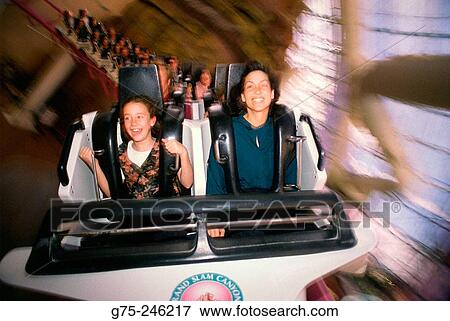 Mother and daughter on roller coaster View Large Photo Image Stock Photo - Mother and daughter on roller coaster. Fotosearch