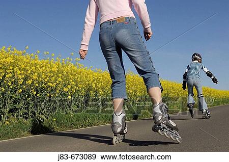 Mother and daughter on roller skates, Inline skates, Saxony, Germany. View Large Photo Image Stock Photo - Mother and daughter on roller skates, Inline skates, Saxony, Germany.. Fotosearch