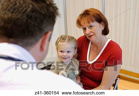 Mother and daughter on the pediatrist View Large Photo Image Picture - Mother and daughter on the pediatrist. Fotosearch